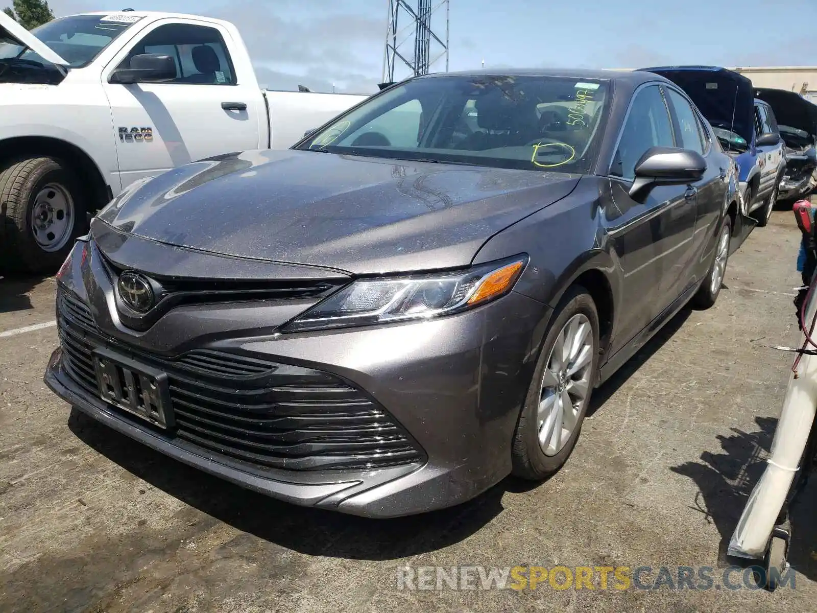 2 Photograph of a damaged car 4T1B11HKXKU263864 TOYOTA CAMRY 2019