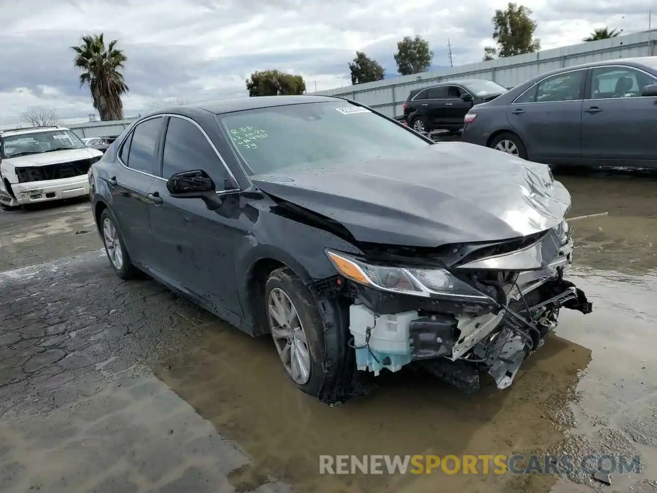 4 Photograph of a damaged car 4T1B11HKXKU264481 TOYOTA CAMRY 2019