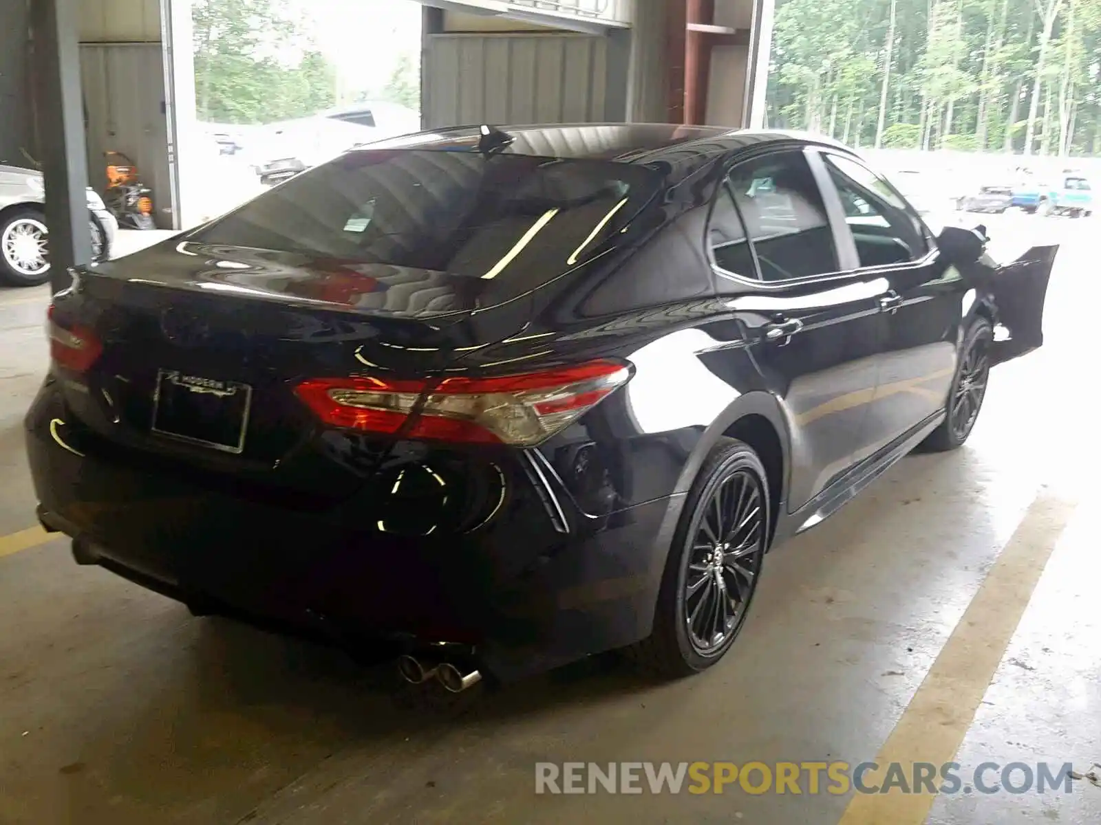 4 Photograph of a damaged car 4T1B11HKXKU264870 TOYOTA CAMRY 2019