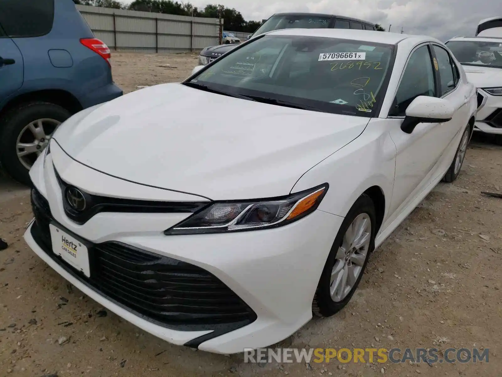 2 Photograph of a damaged car 4T1B11HKXKU268952 TOYOTA CAMRY 2019