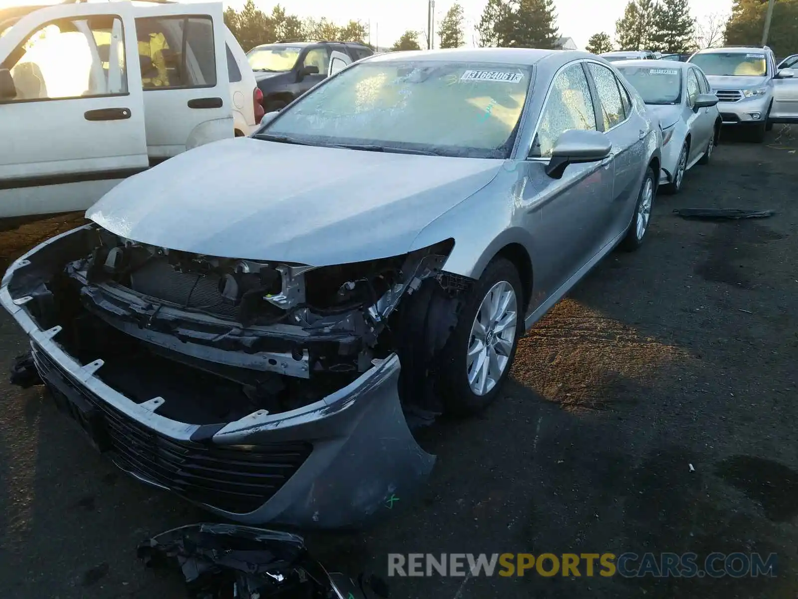 2 Photograph of a damaged car 4T1B11HKXKU270927 TOYOTA CAMRY 2019