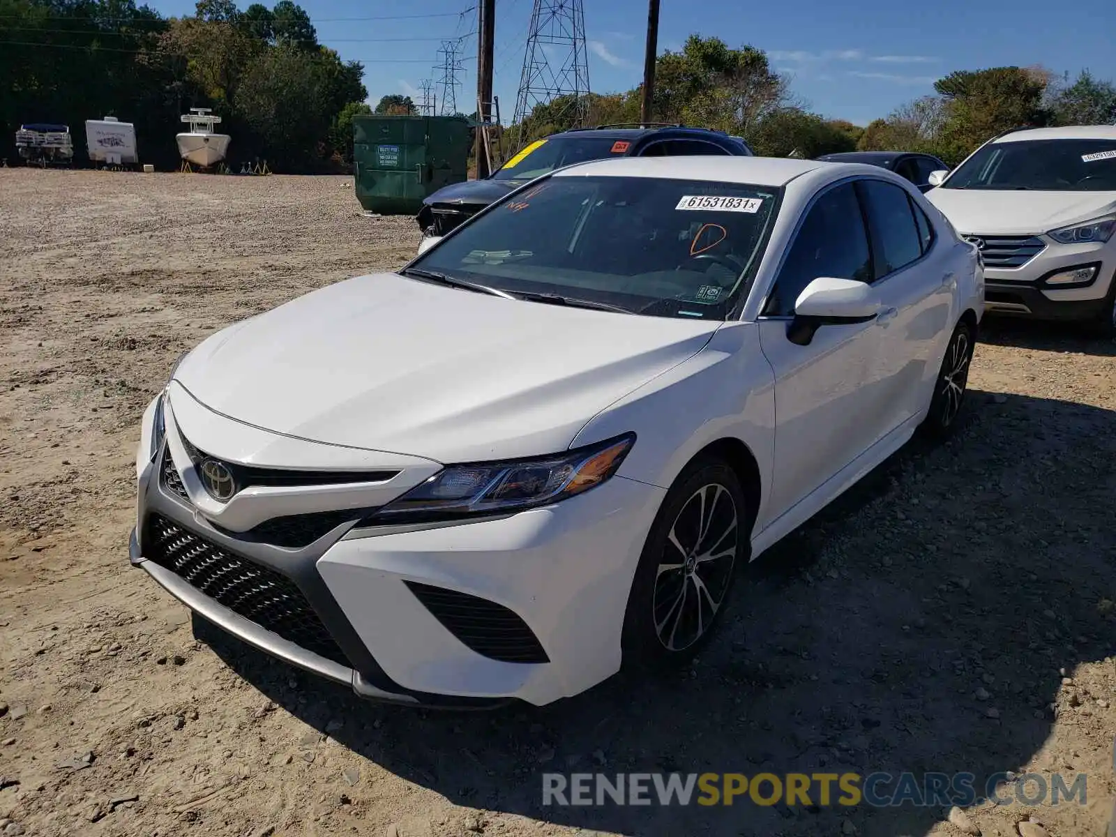 2 Photograph of a damaged car 4T1B11HKXKU280230 TOYOTA CAMRY 2019