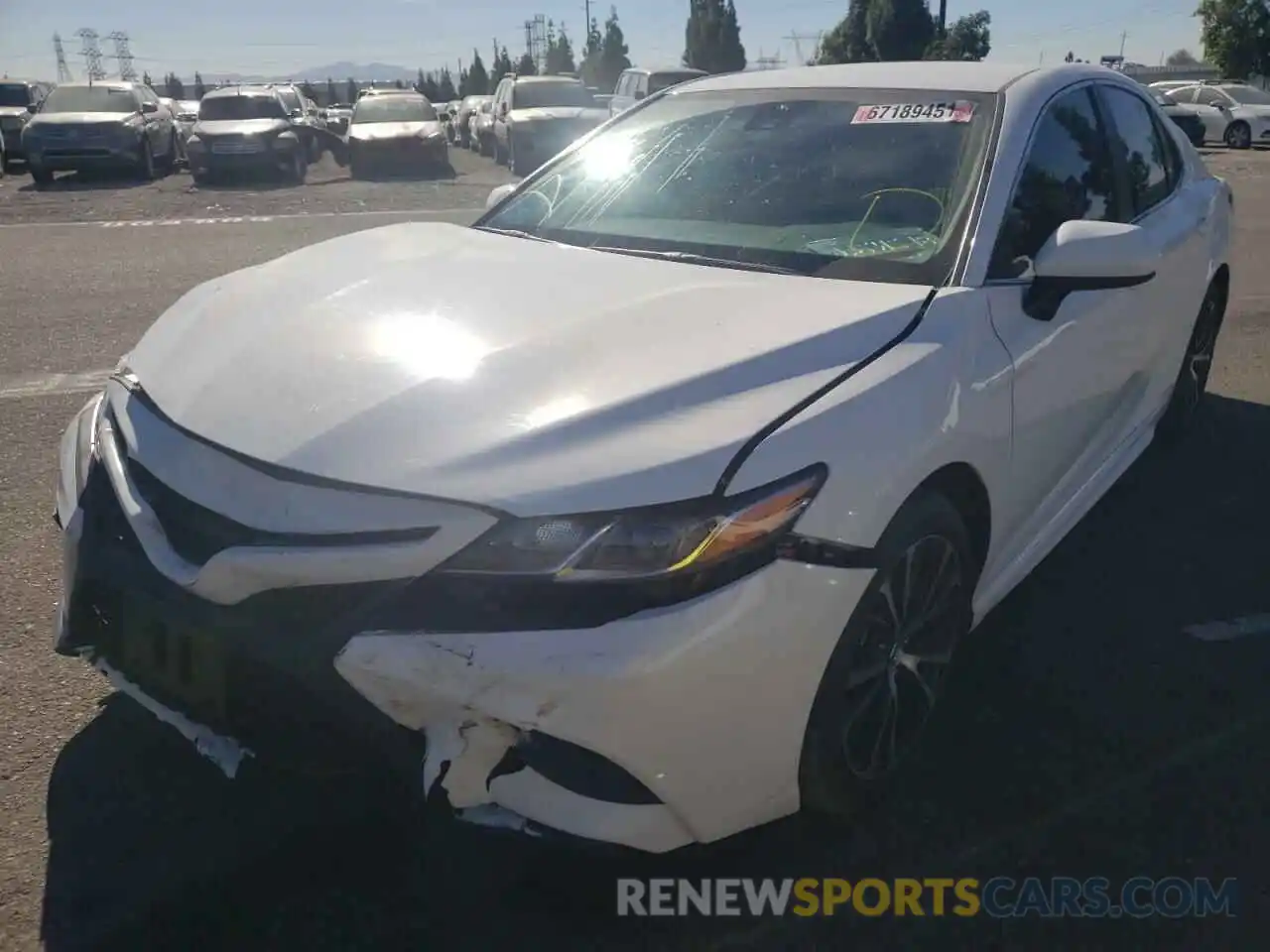 2 Photograph of a damaged car 4T1B11HKXKU299649 TOYOTA CAMRY 2019