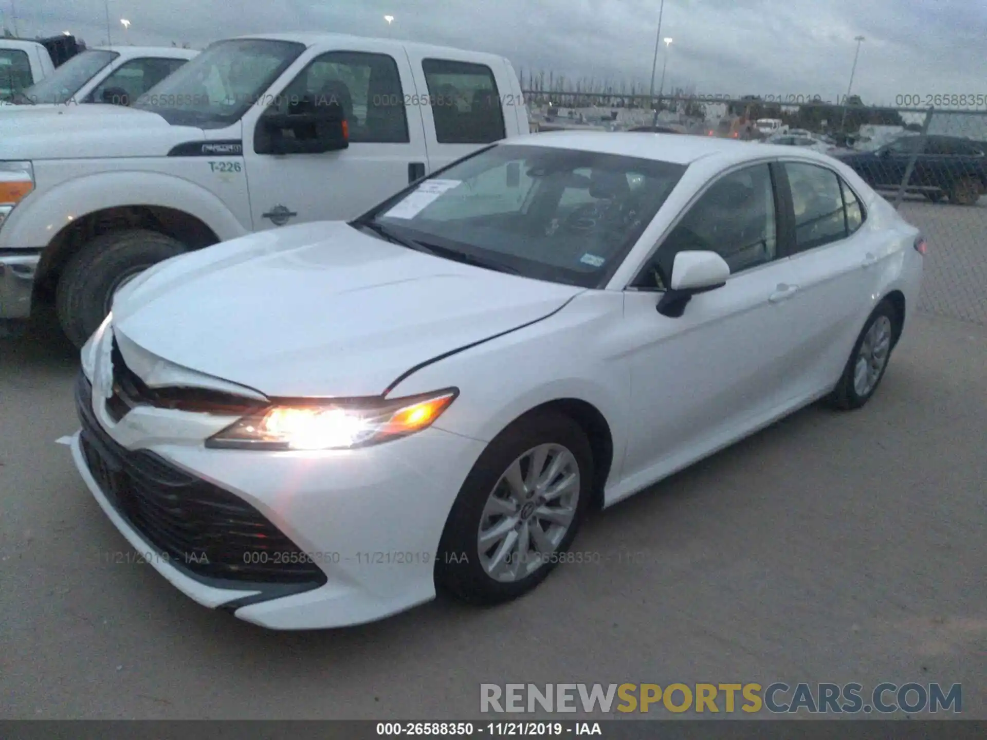 2 Photograph of a damaged car 4T1B11HKXKU679509 TOYOTA CAMRY 2019