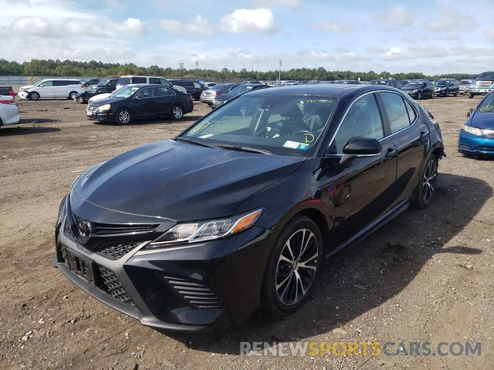 2 Photograph of a damaged car 4T1B11HKXKU679929 TOYOTA CAMRY 2019