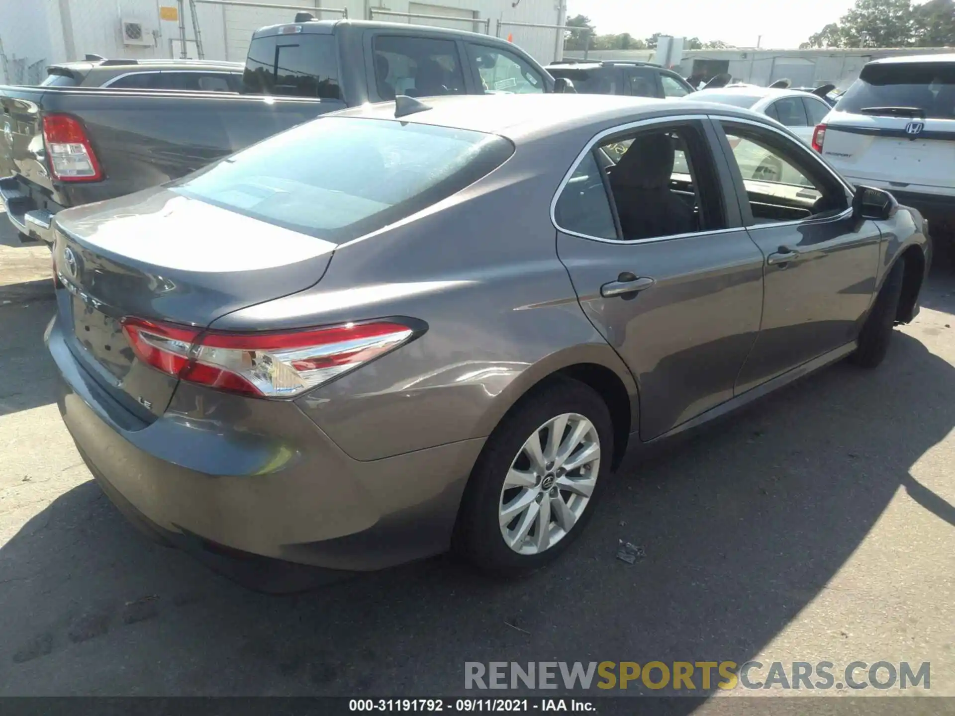 4 Photograph of a damaged car 4T1B11HKXKU680899 TOYOTA CAMRY 2019