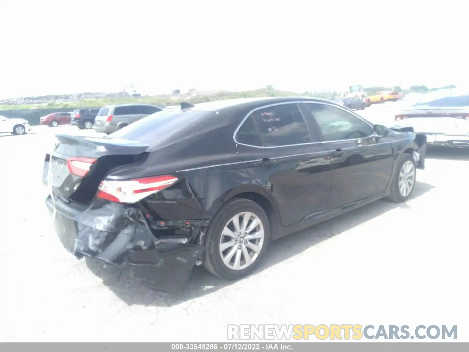 4 Photograph of a damaged car 4T1B11HKXKU684869 TOYOTA CAMRY 2019