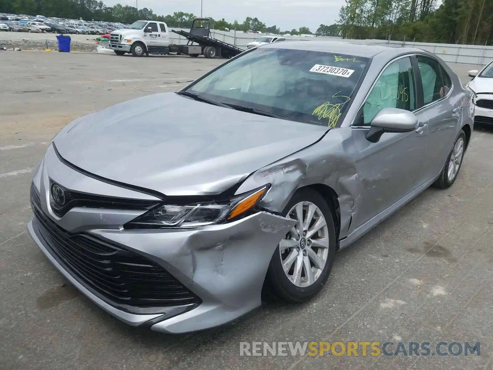 2 Photograph of a damaged car 4T1B11HKXKU686170 TOYOTA CAMRY 2019