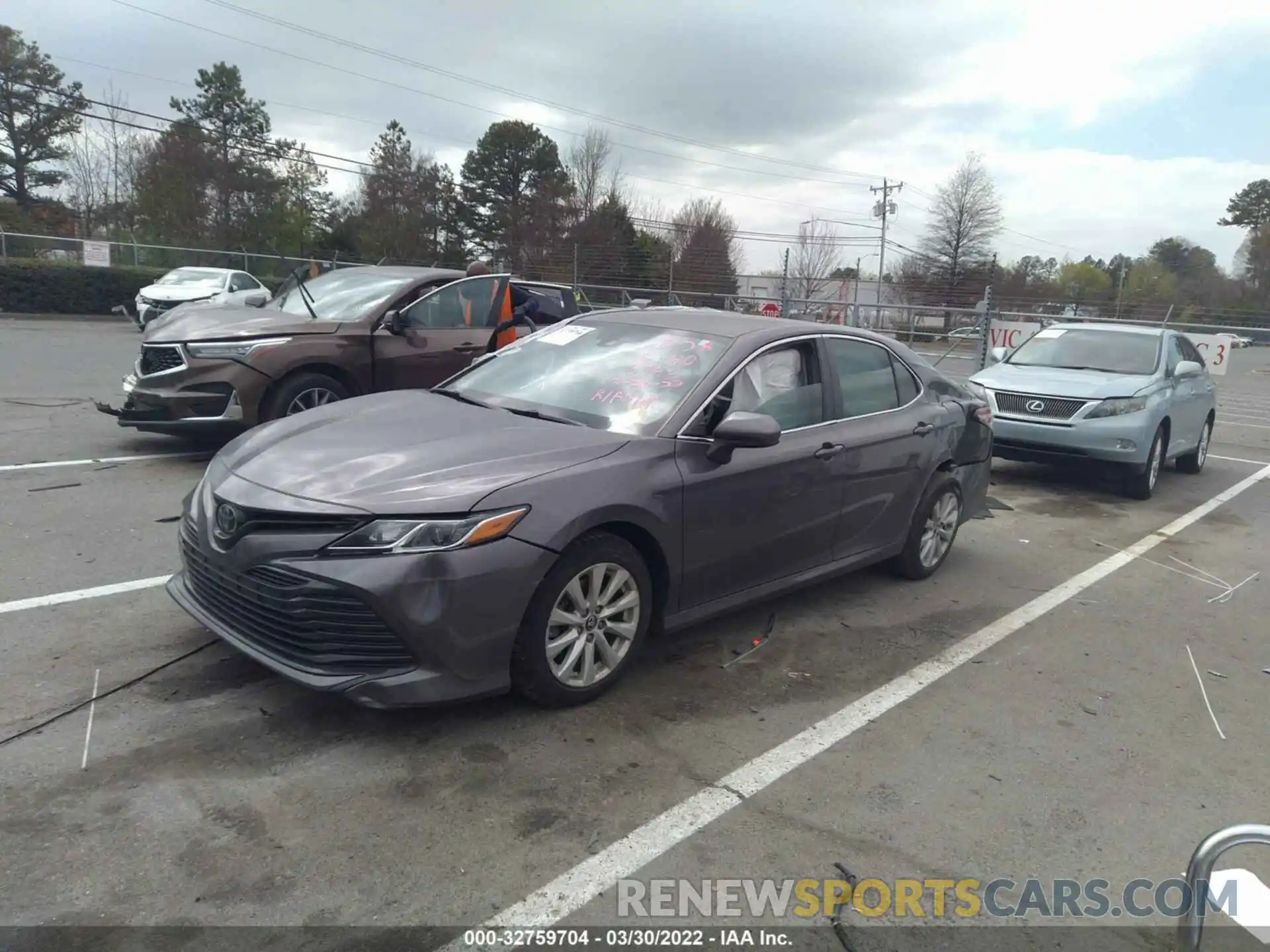 2 Photograph of a damaged car 4T1B11HKXKU686945 TOYOTA CAMRY 2019