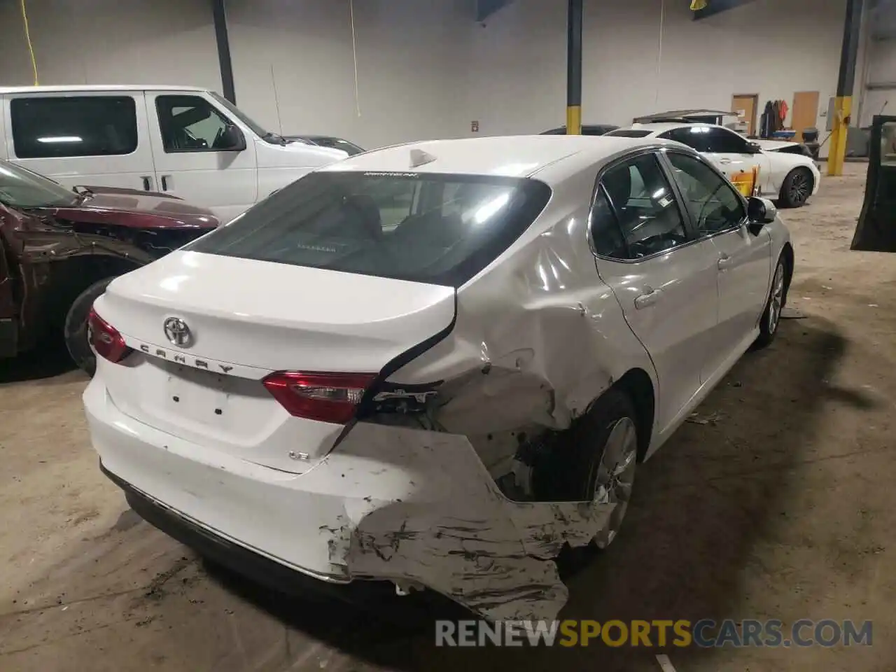 4 Photograph of a damaged car 4T1B11HKXKU689750 TOYOTA CAMRY 2019