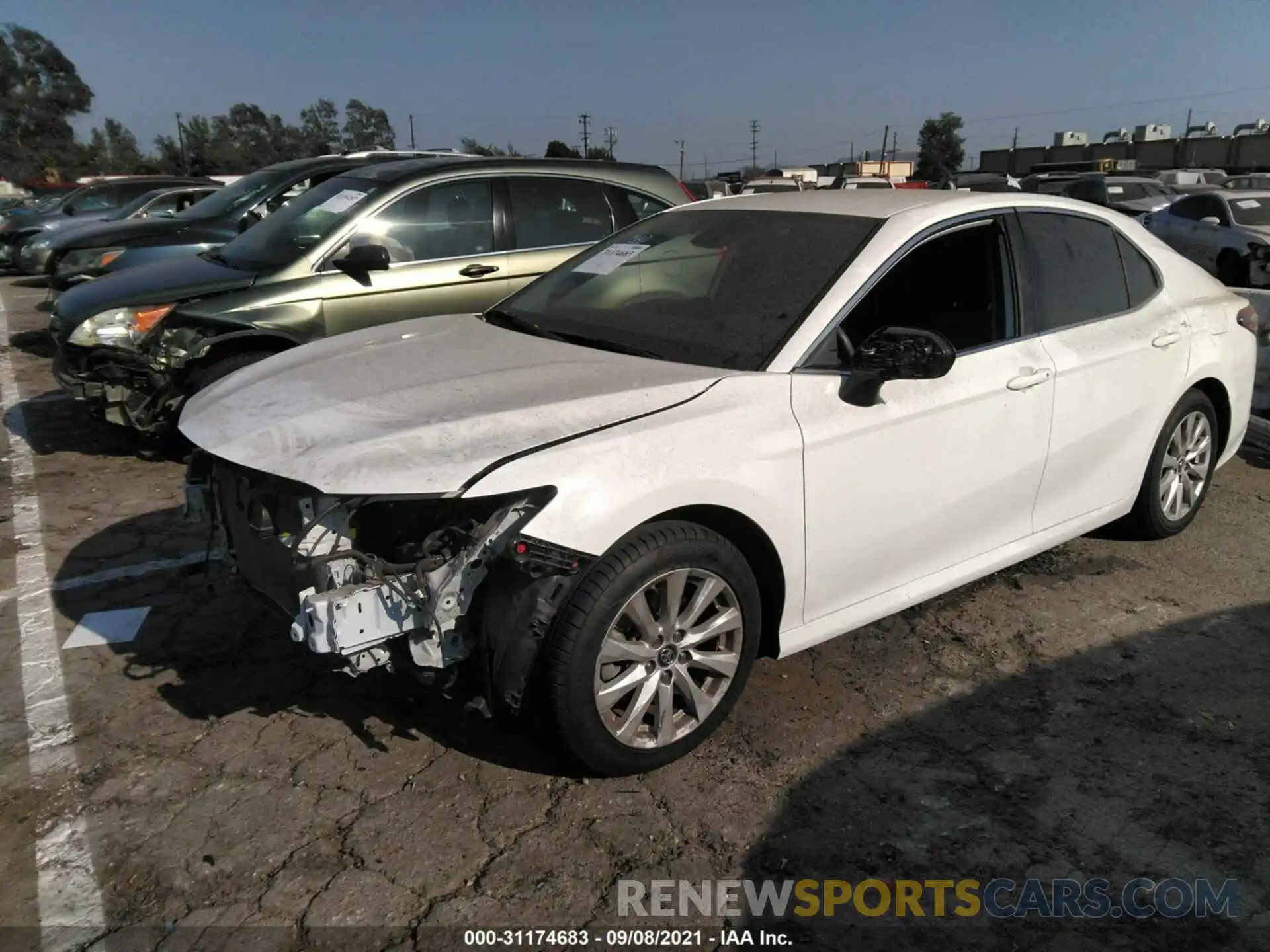 2 Photograph of a damaged car 4T1B11HKXKU689926 TOYOTA CAMRY 2019