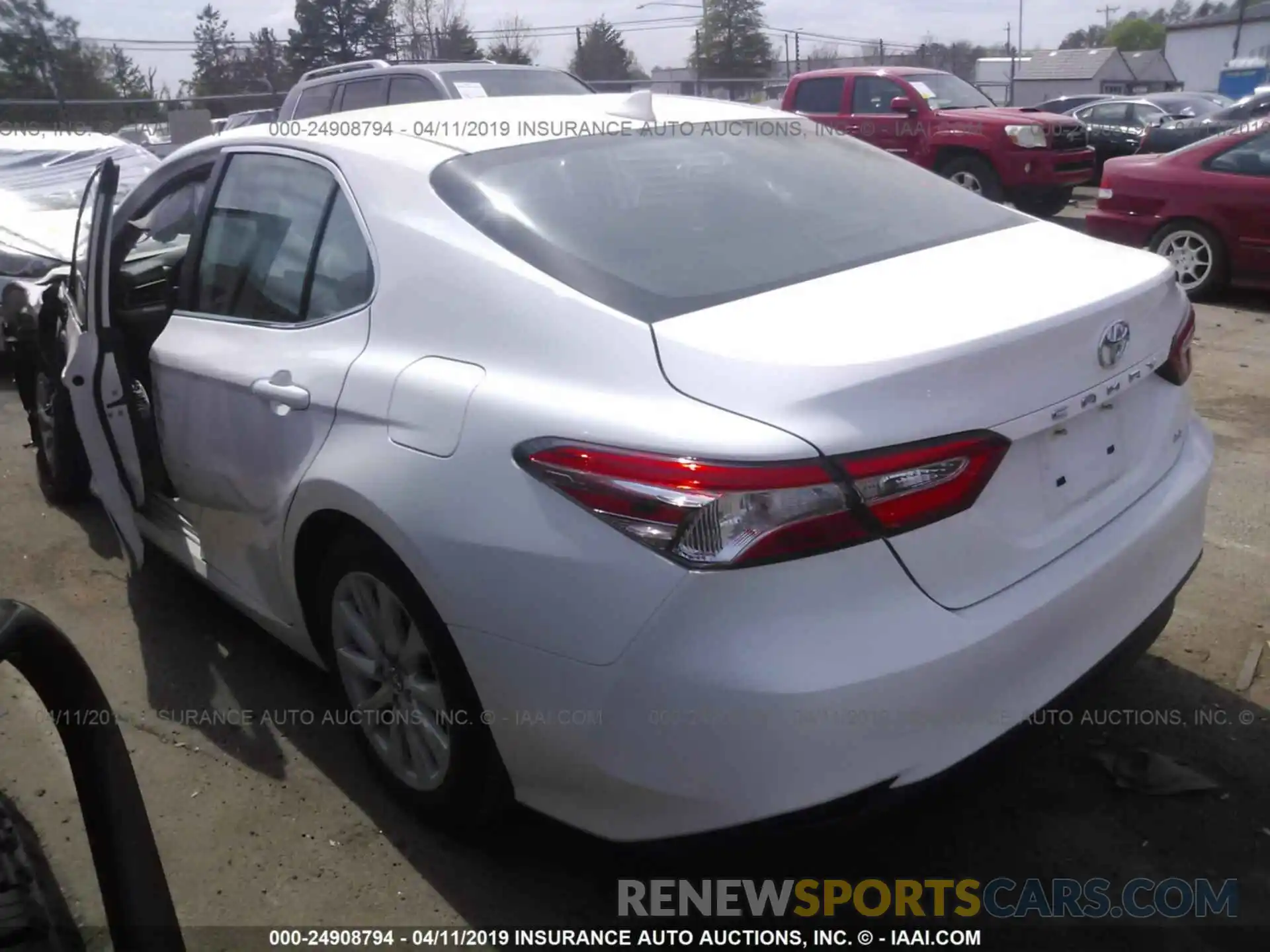 3 Photograph of a damaged car 4T1B11HKXKU690977 TOYOTA CAMRY 2019