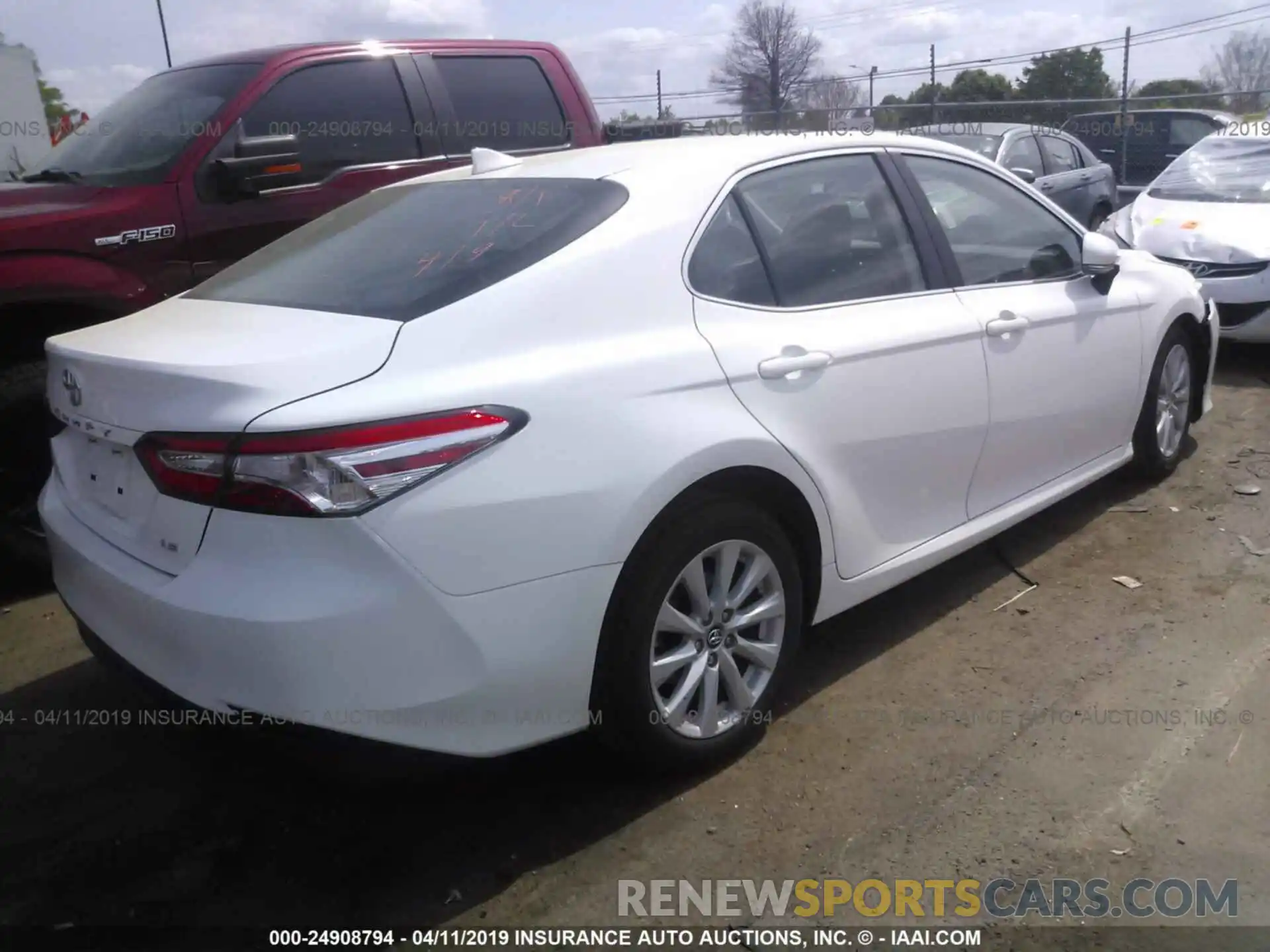 4 Photograph of a damaged car 4T1B11HKXKU690977 TOYOTA CAMRY 2019