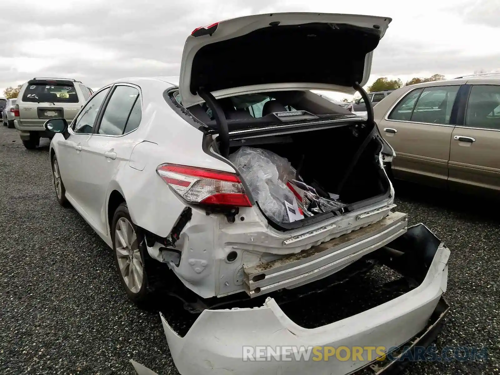 3 Photograph of a damaged car 4T1B11HKXKU691532 TOYOTA CAMRY 2019