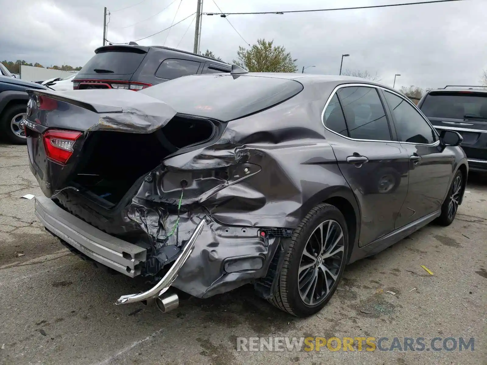 4 Photograph of a damaged car 4T1B11HKXKU693605 TOYOTA CAMRY 2019