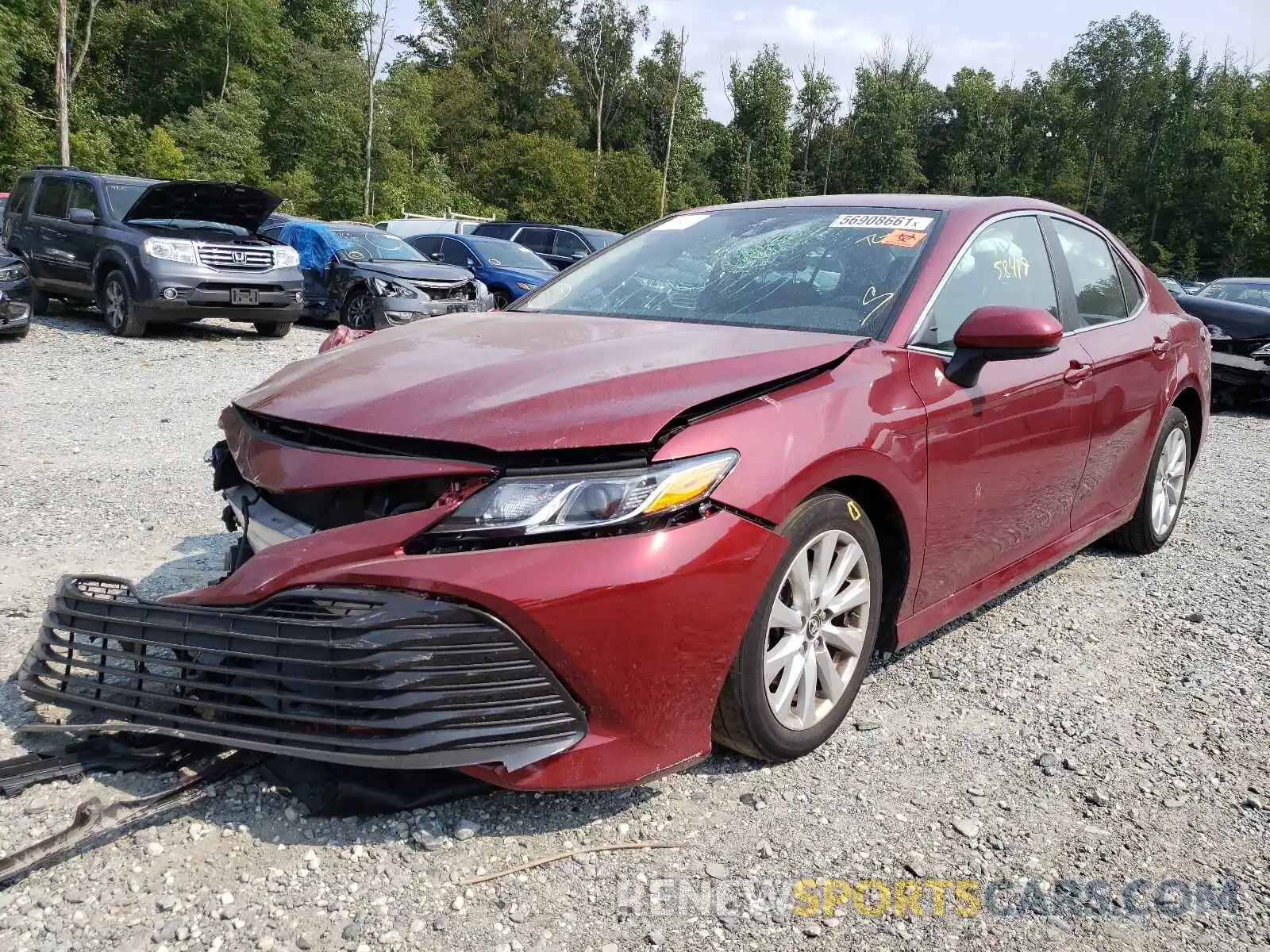 2 Photograph of a damaged car 4T1B11HKXKU694110 TOYOTA CAMRY 2019