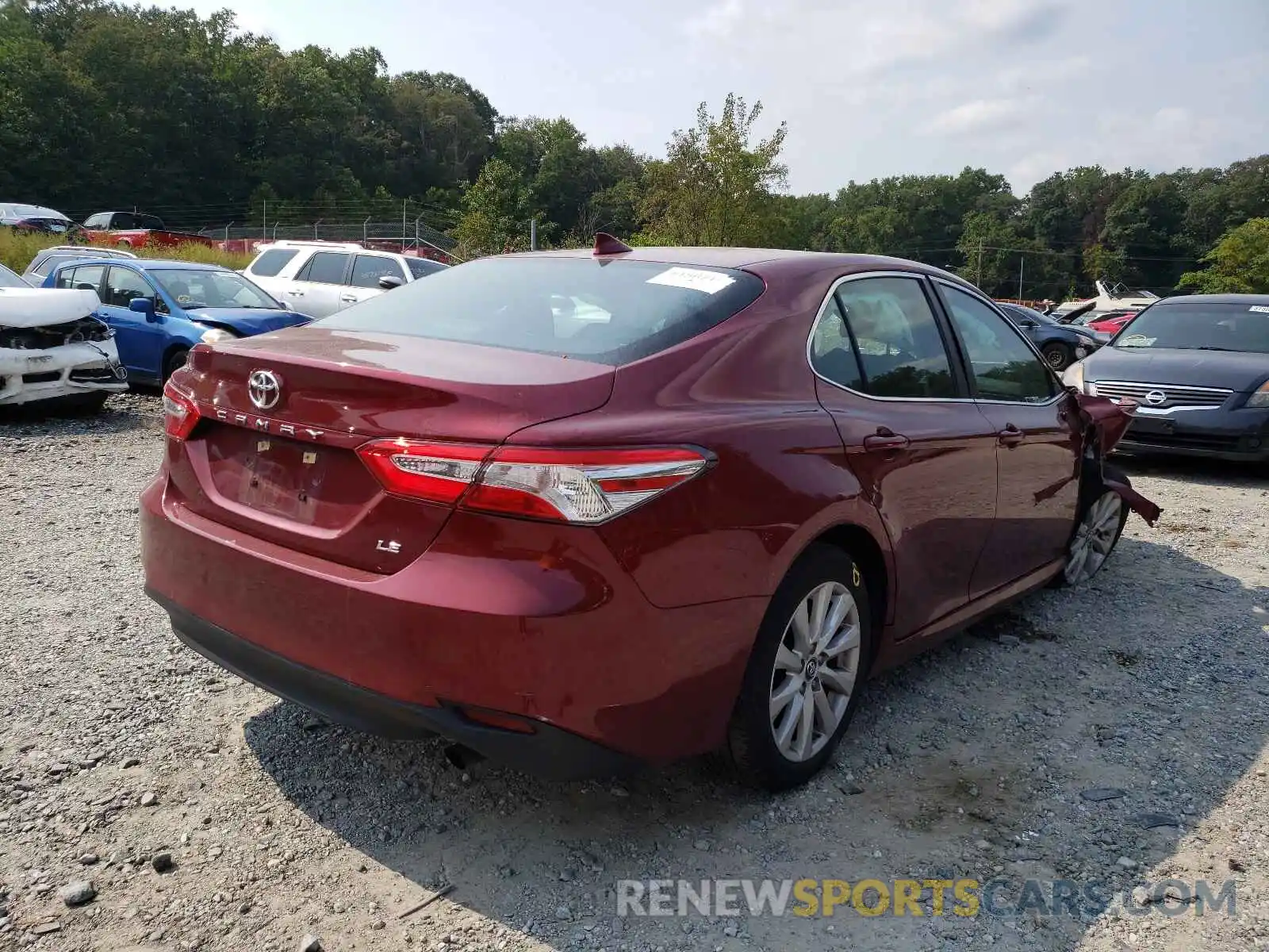 4 Photograph of a damaged car 4T1B11HKXKU694110 TOYOTA CAMRY 2019