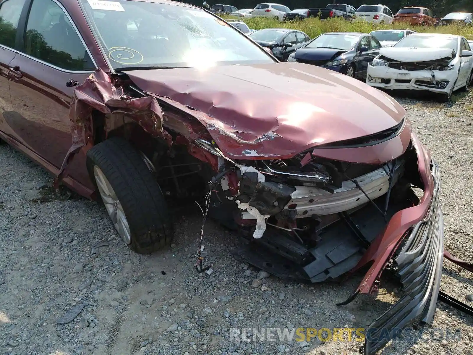 9 Photograph of a damaged car 4T1B11HKXKU694110 TOYOTA CAMRY 2019