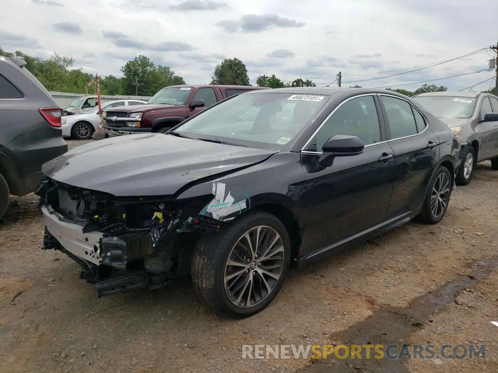 2 Photograph of a damaged car 4T1B11HKXKU695063 TOYOTA CAMRY 2019