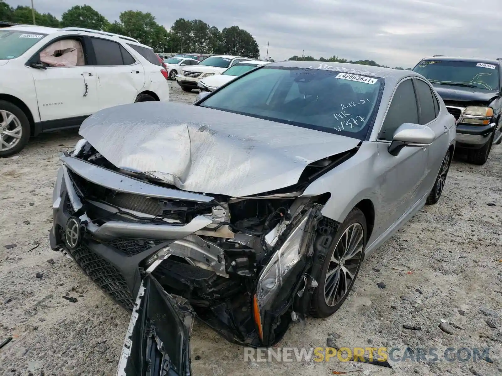 2 Photograph of a damaged car 4T1B11HKXKU701377 TOYOTA CAMRY 2019