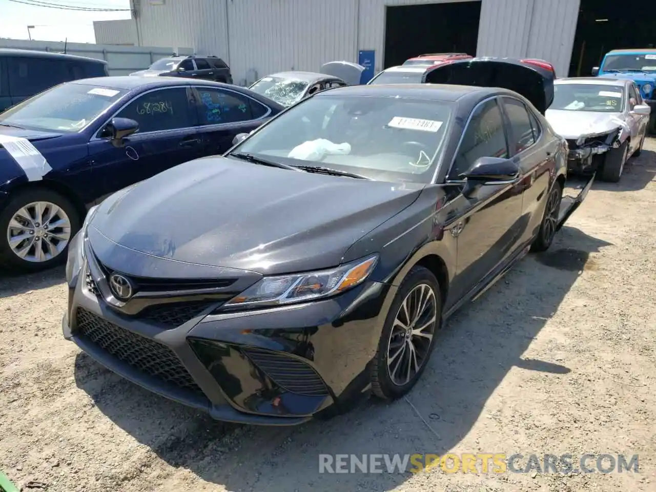 2 Photograph of a damaged car 4T1B11HKXKU702304 TOYOTA CAMRY 2019