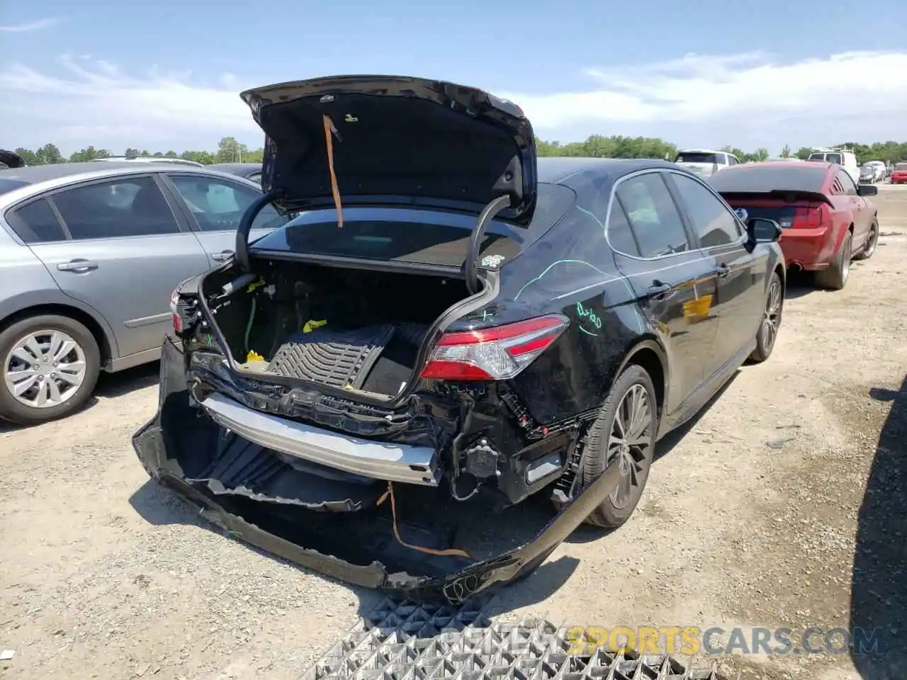 4 Photograph of a damaged car 4T1B11HKXKU702304 TOYOTA CAMRY 2019