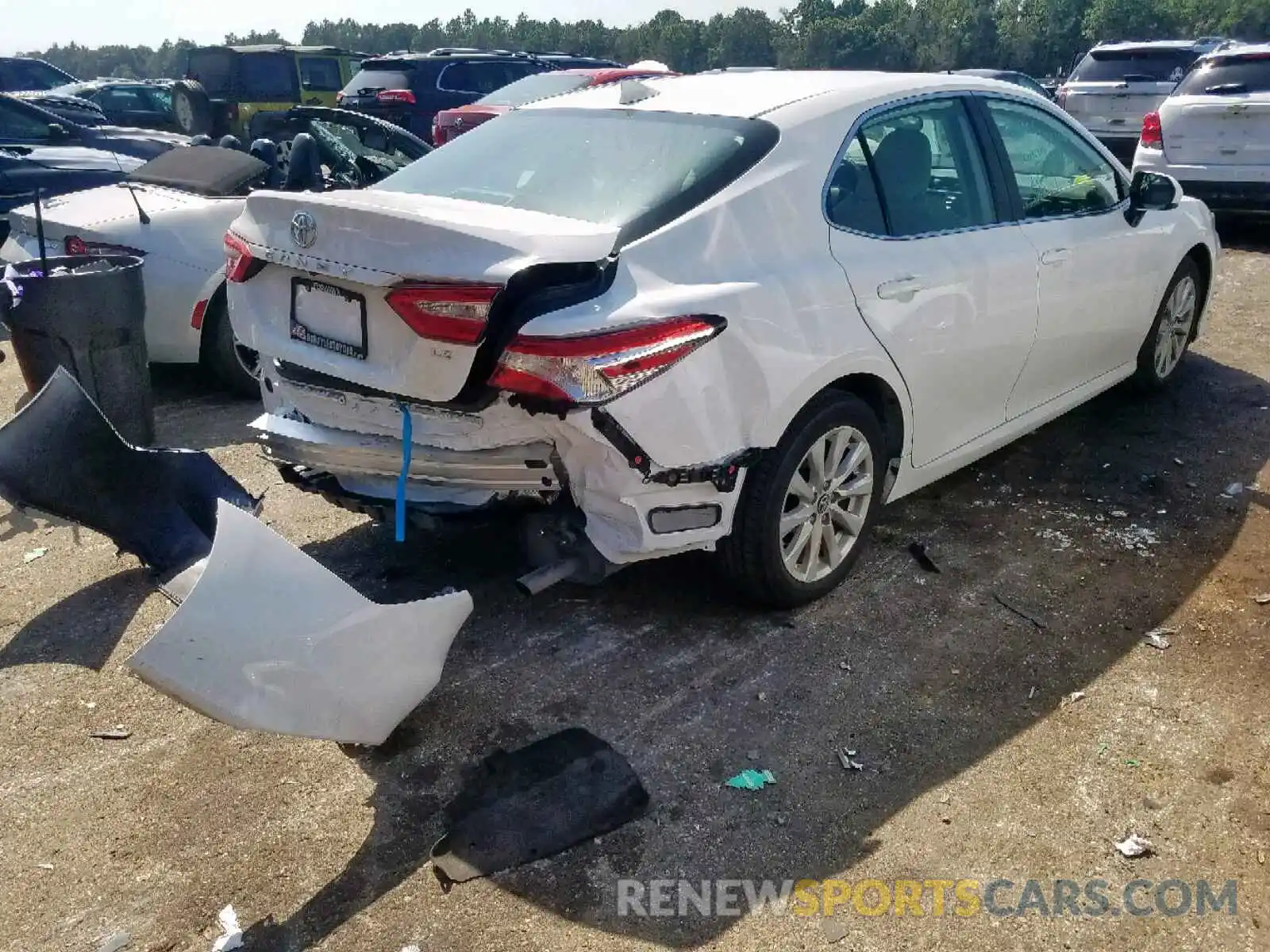 4 Photograph of a damaged car 4T1B11HKXKU703839 TOYOTA CAMRY 2019