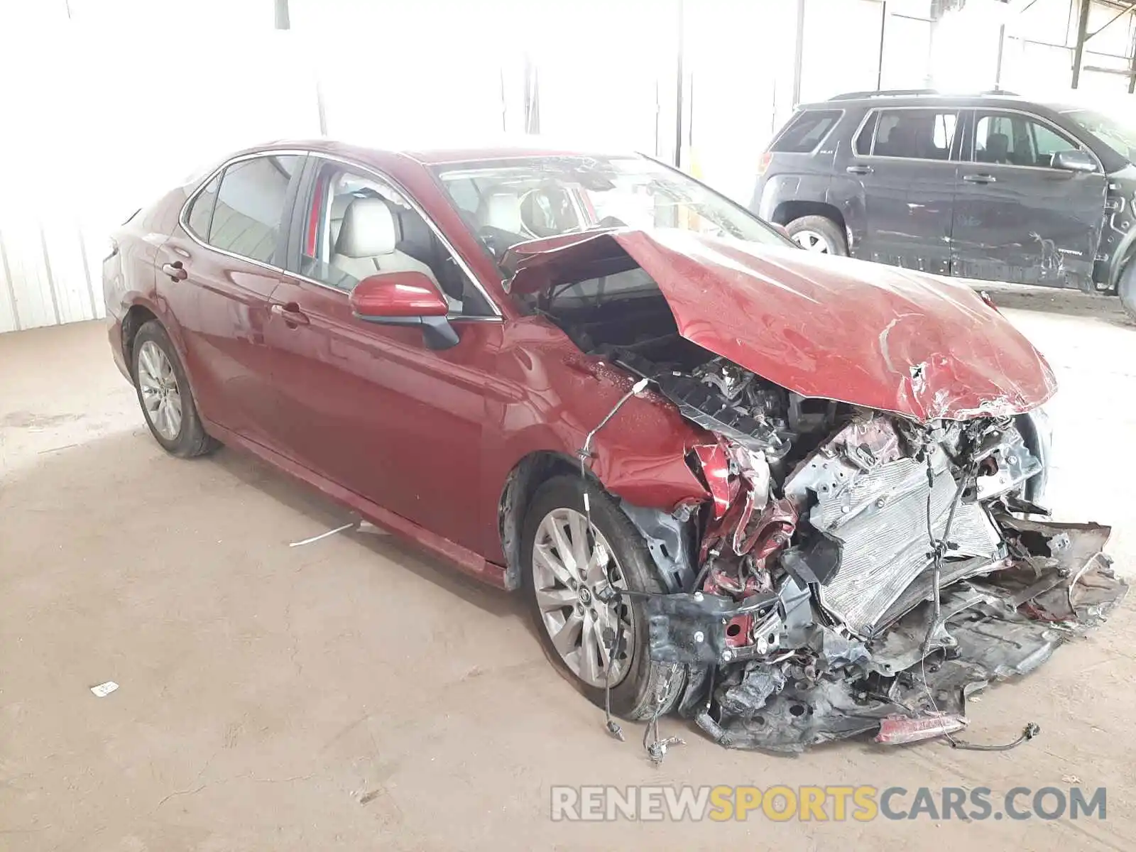 1 Photograph of a damaged car 4T1B11HKXKU704506 TOYOTA CAMRY 2019