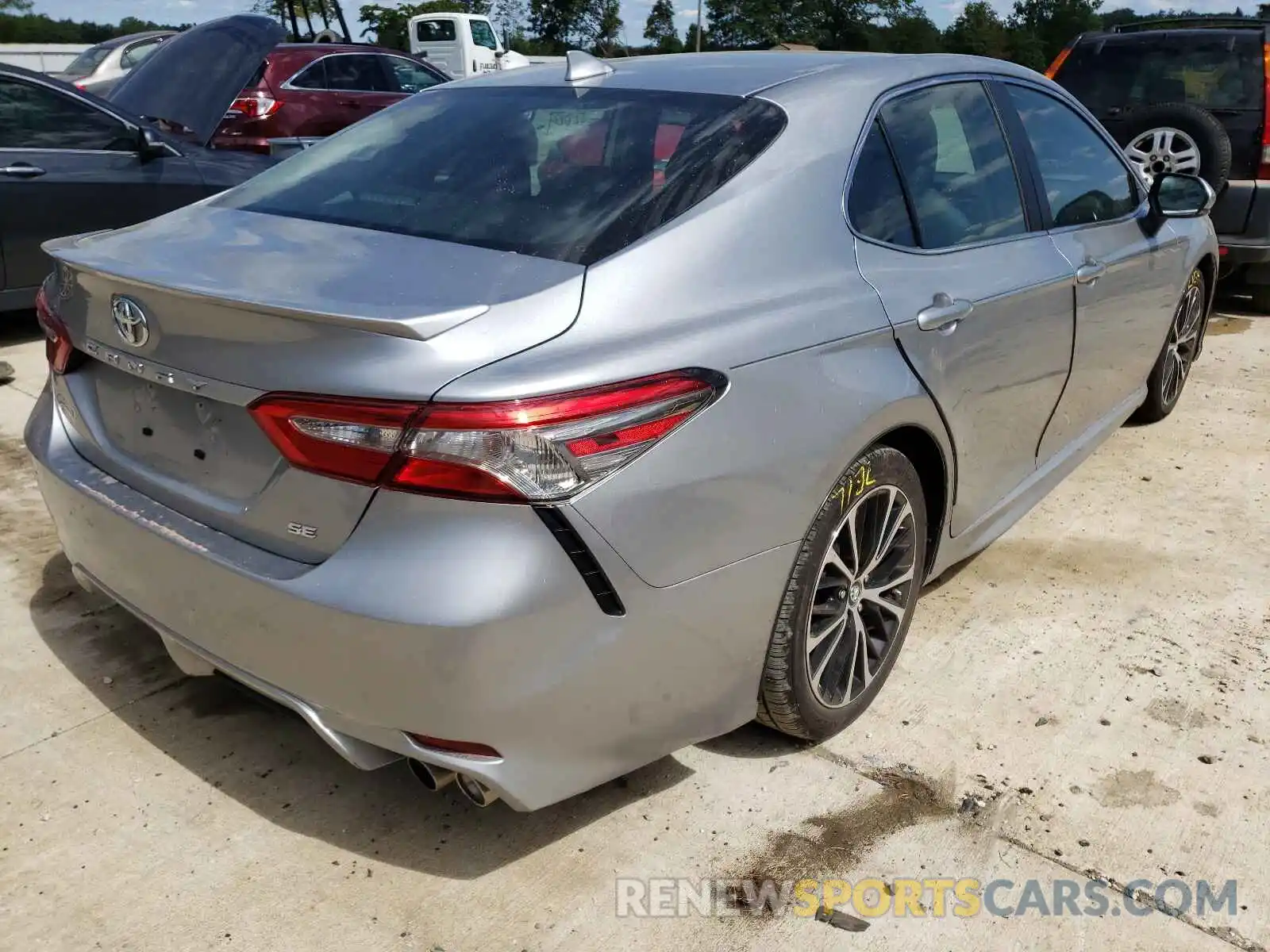 4 Photograph of a damaged car 4T1B11HKXKU704778 TOYOTA CAMRY 2019