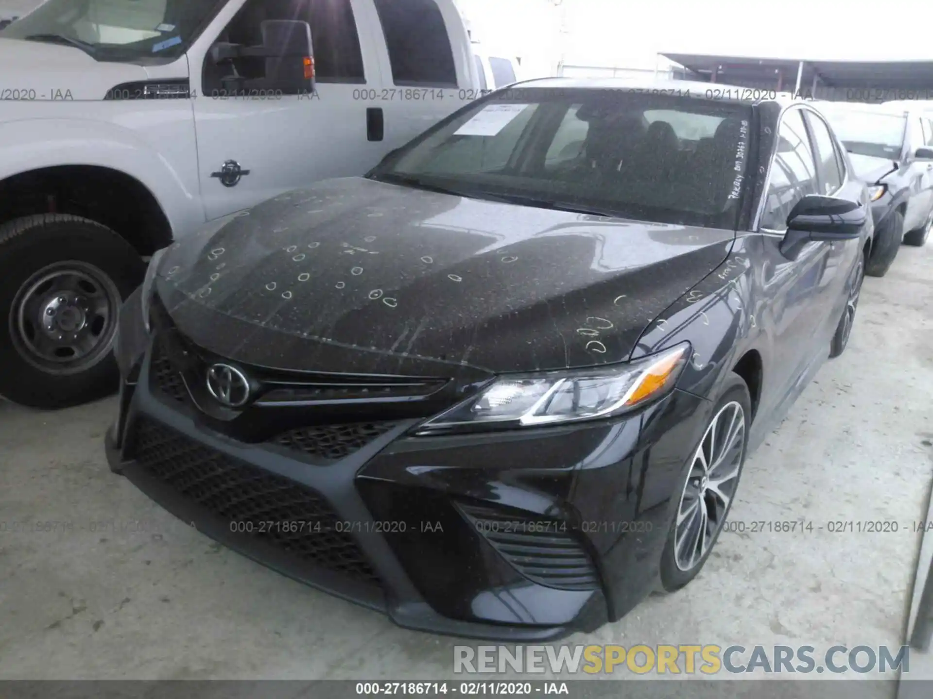 2 Photograph of a damaged car 4T1B11HKXKU704859 TOYOTA CAMRY 2019