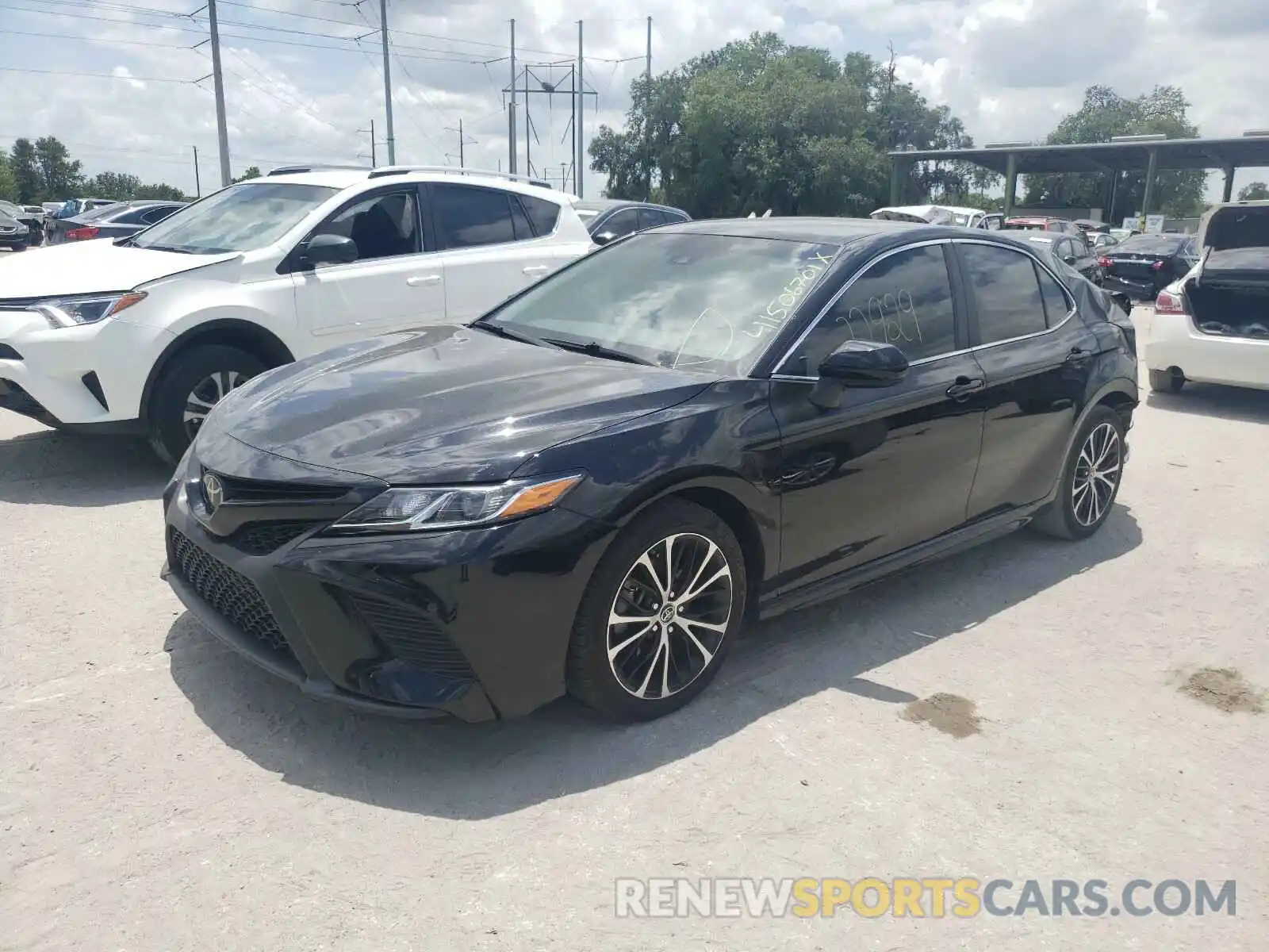 2 Photograph of a damaged car 4T1B11HKXKU708961 TOYOTA CAMRY 2019