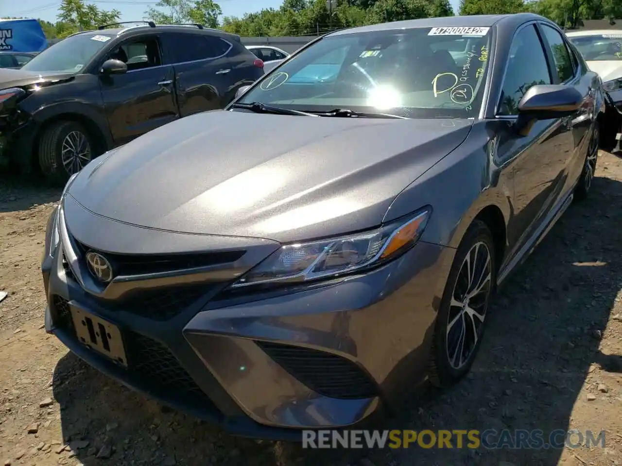 2 Photograph of a damaged car 4T1B11HKXKU710659 TOYOTA CAMRY 2019