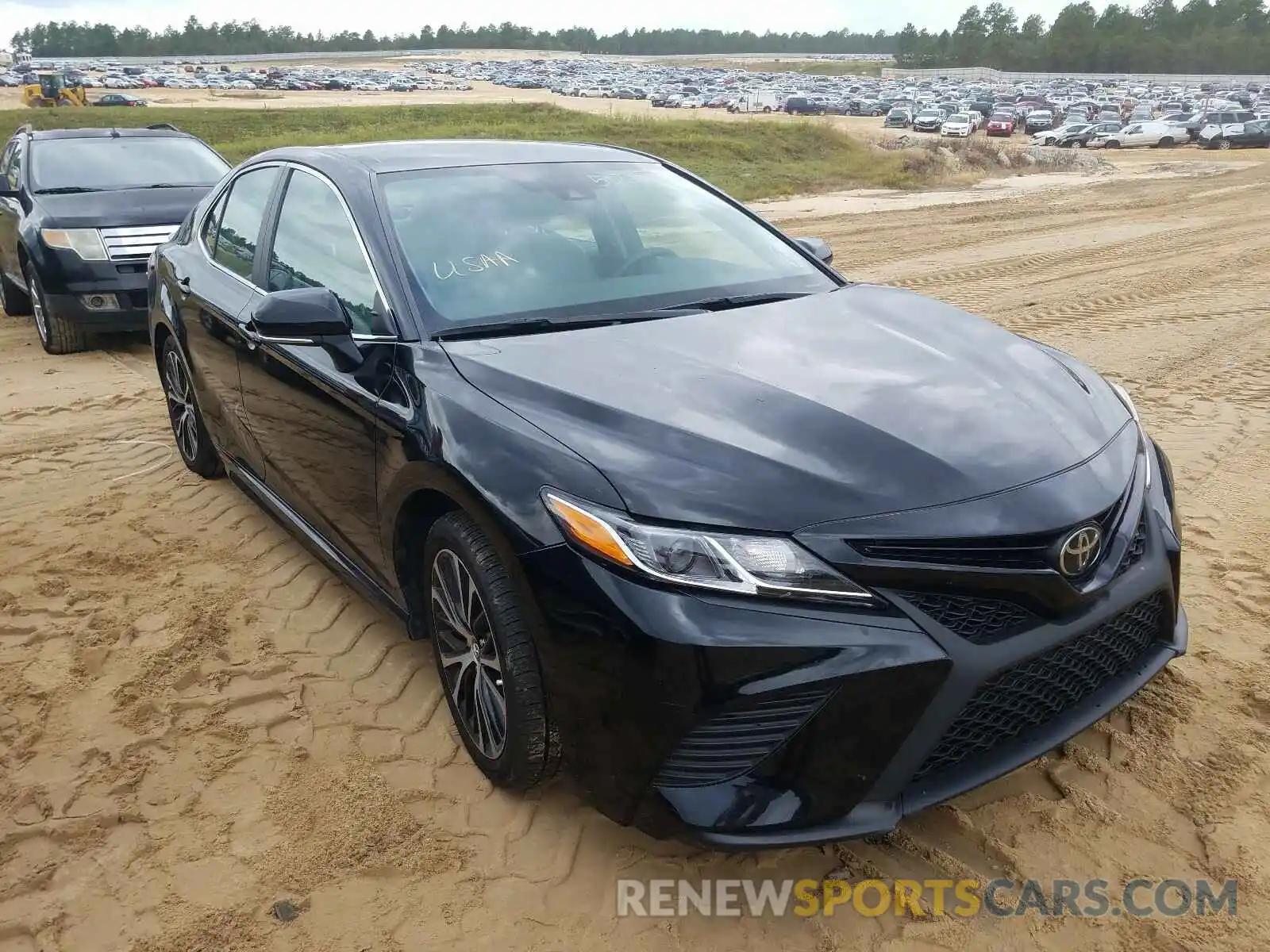 1 Photograph of a damaged car 4T1B11HKXKU710855 TOYOTA CAMRY 2019