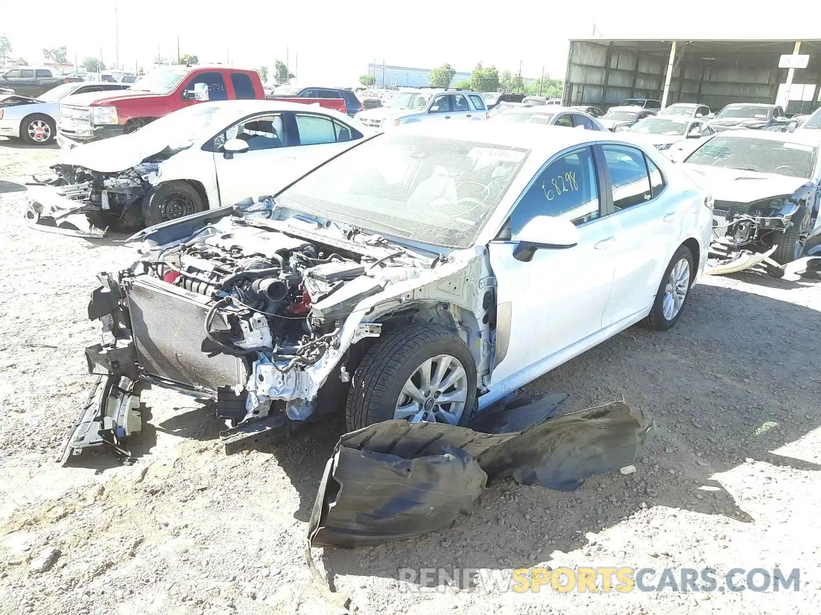 2 Photograph of a damaged car 4T1B11HKXKU713156 TOYOTA CAMRY 2019