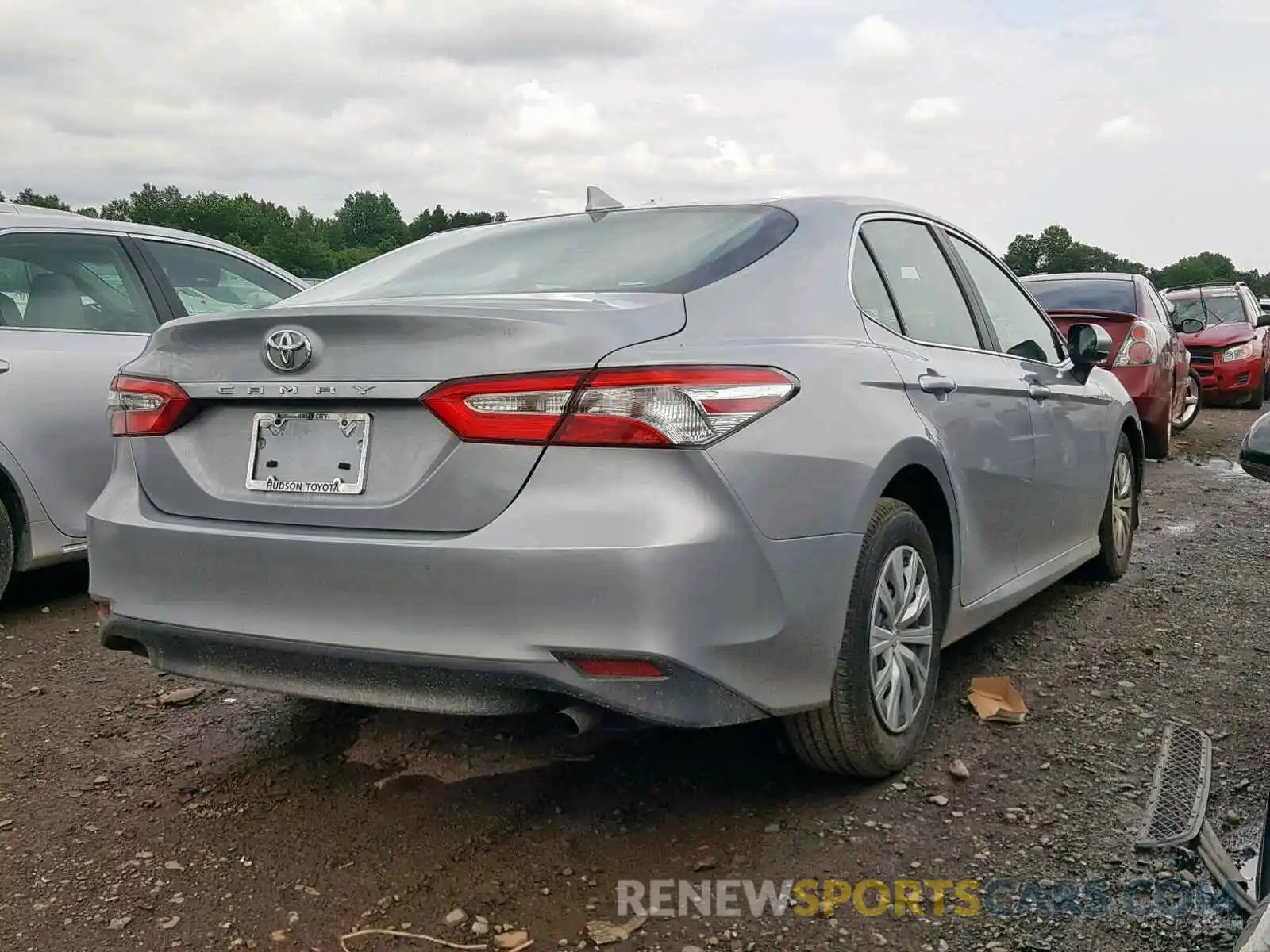 4 Photograph of a damaged car 4T1B11HKXKU713514 TOYOTA CAMRY 2019