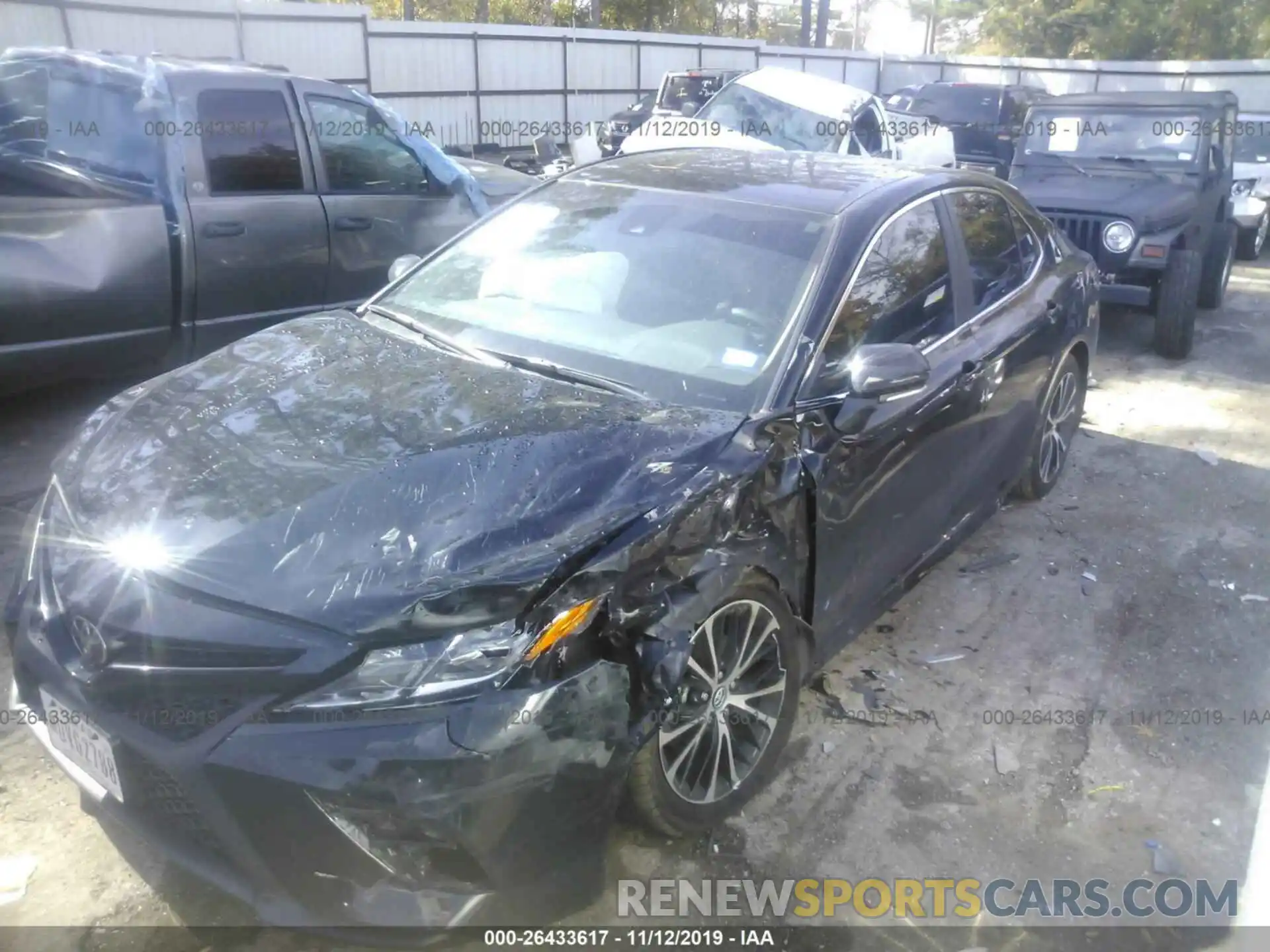 2 Photograph of a damaged car 4T1B11HKXKU714193 TOYOTA CAMRY 2019