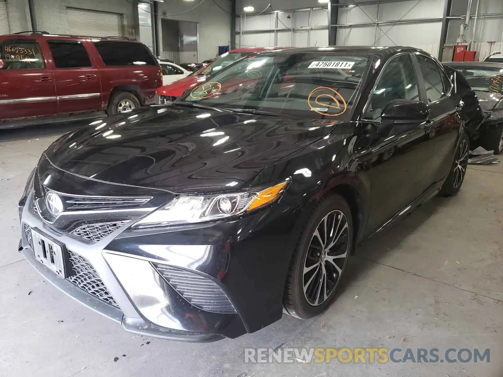 2 Photograph of a damaged car 4T1B11HKXKU715750 TOYOTA CAMRY 2019