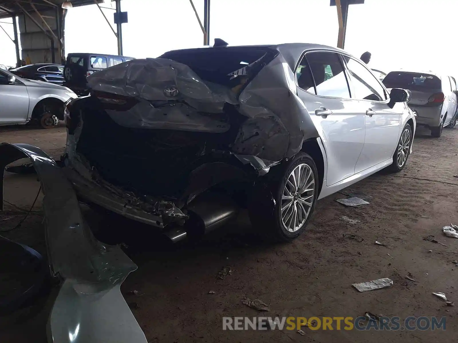 4 Photograph of a damaged car 4T1B11HKXKU716106 TOYOTA CAMRY 2019