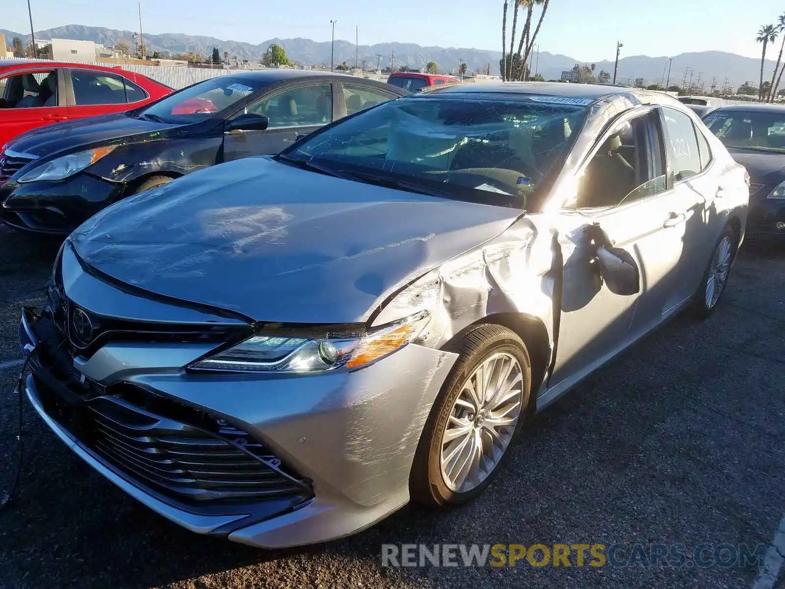 2 Photograph of a damaged car 4T1B11HKXKU719409 TOYOTA CAMRY 2019