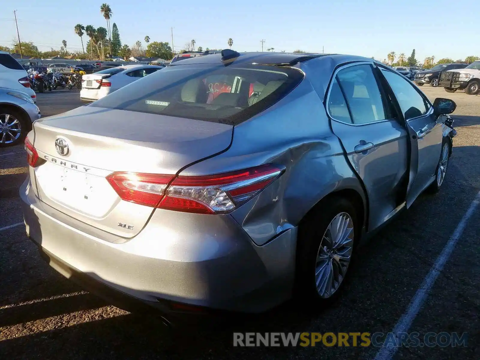 4 Photograph of a damaged car 4T1B11HKXKU719409 TOYOTA CAMRY 2019