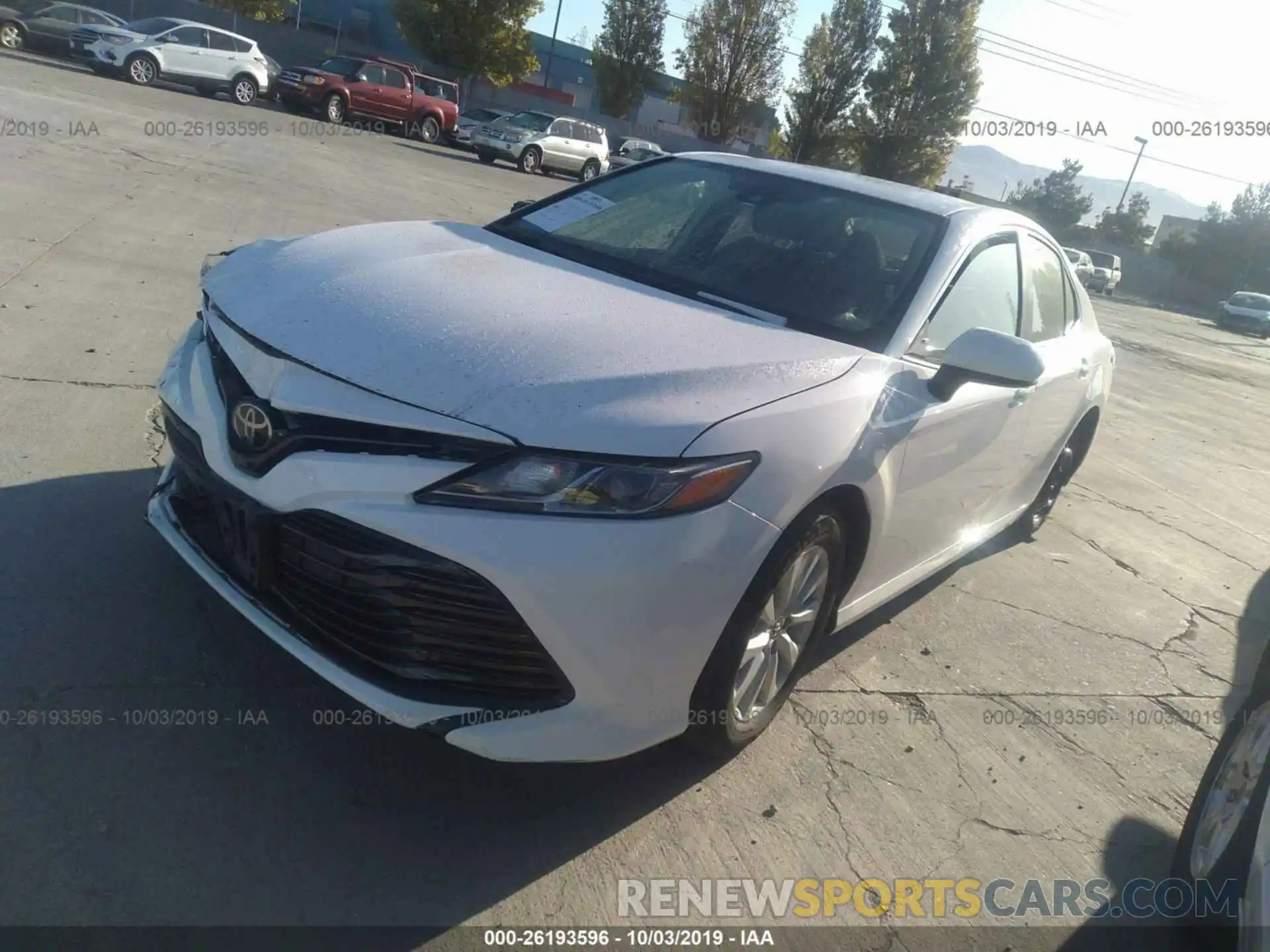 2 Photograph of a damaged car 4T1B11HKXKU720429 TOYOTA CAMRY 2019