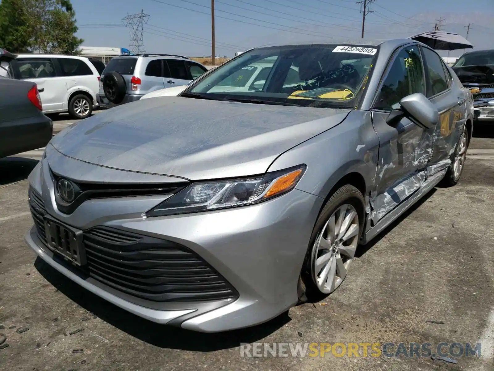 2 Photograph of a damaged car 4T1B11HKXKU724738 TOYOTA CAMRY 2019