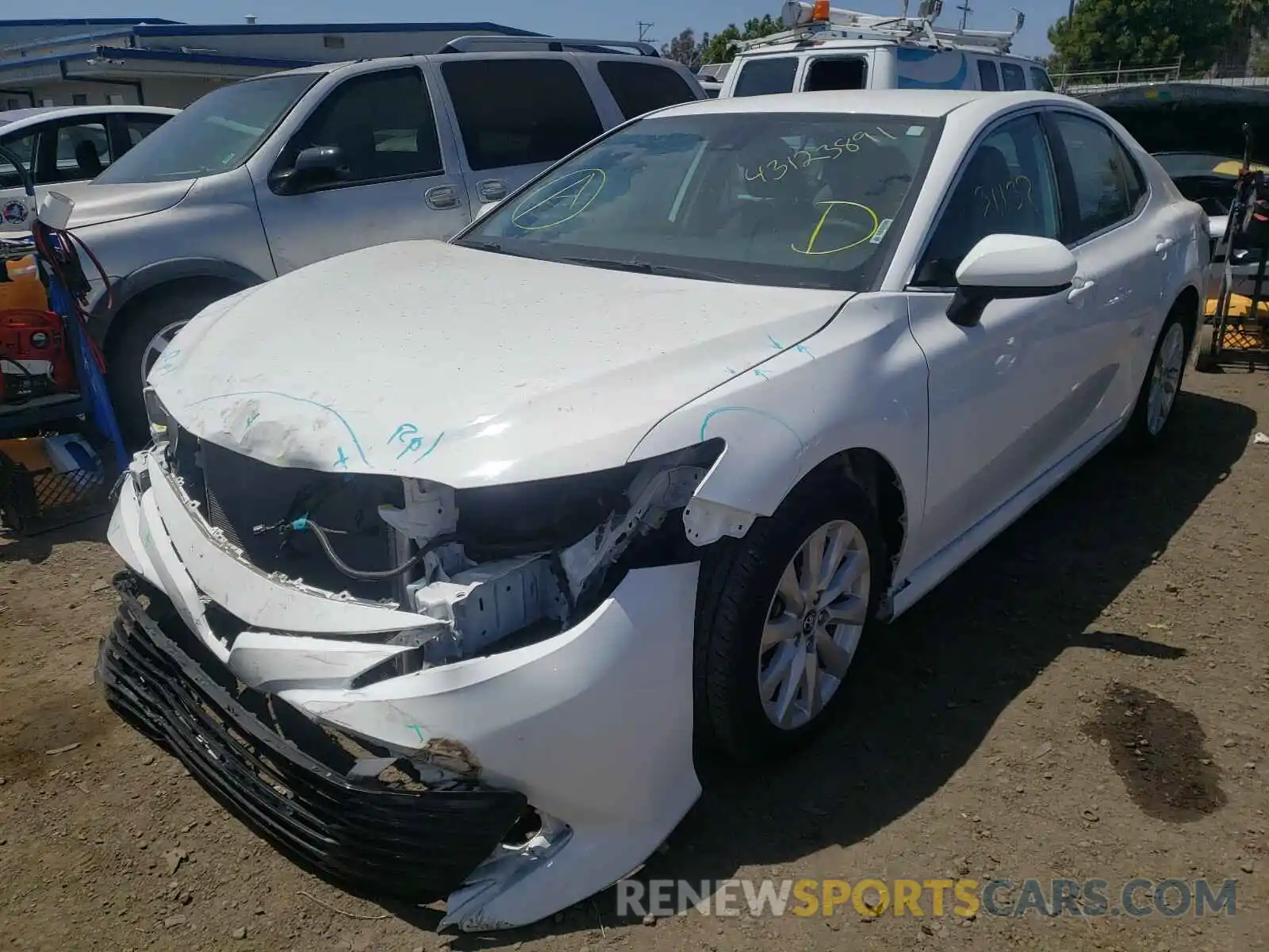 2 Photograph of a damaged car 4T1B11HKXKU725565 TOYOTA CAMRY 2019