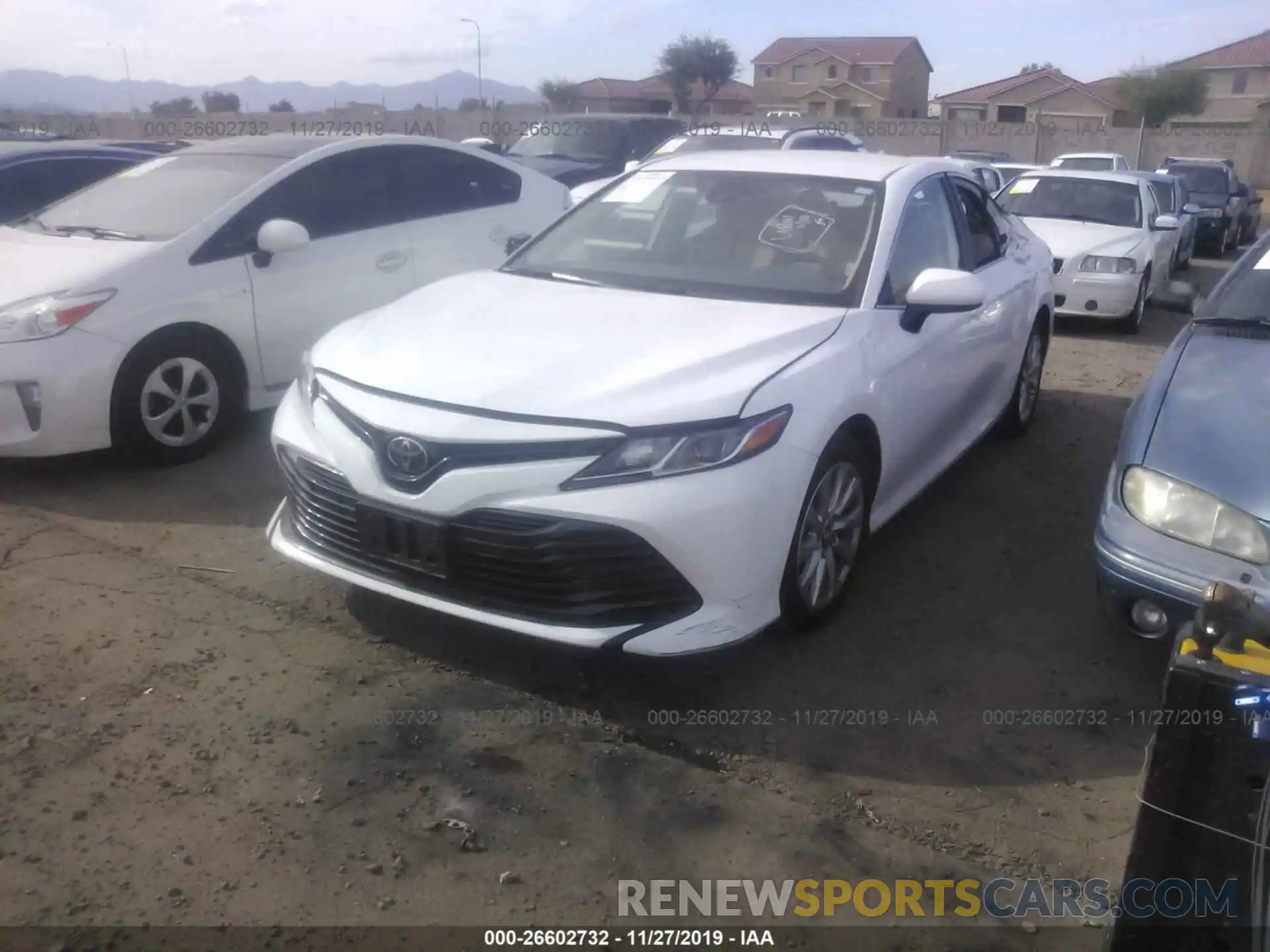 2 Photograph of a damaged car 4T1B11HKXKU729003 TOYOTA CAMRY 2019