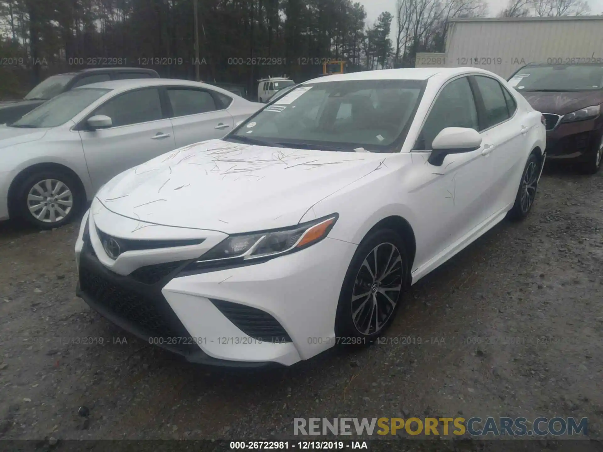 2 Photograph of a damaged car 4T1B11HKXKU730393 TOYOTA CAMRY 2019