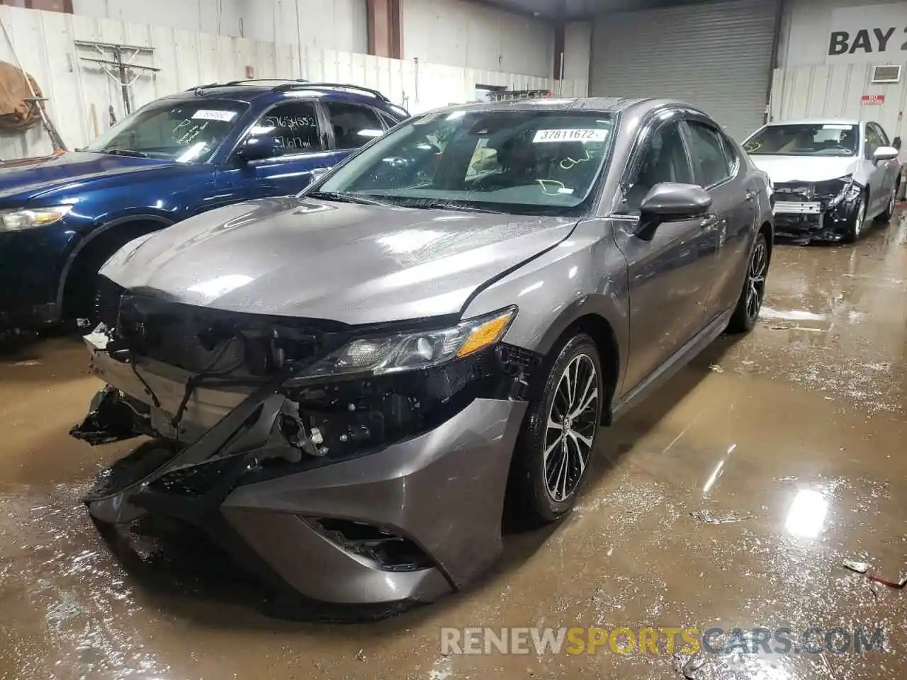 2 Photograph of a damaged car 4T1B11HKXKU739627 TOYOTA CAMRY 2019