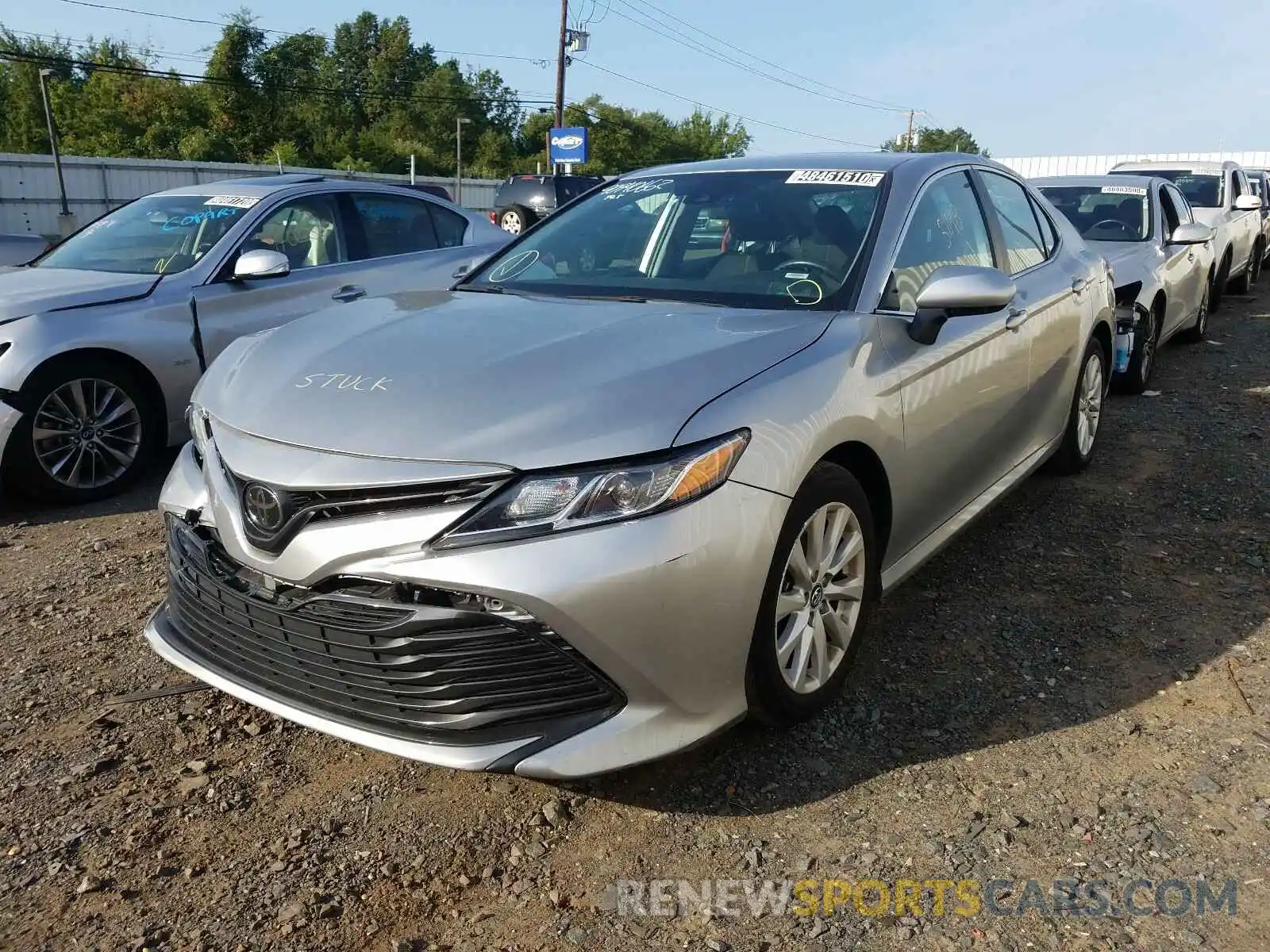 2 Photograph of a damaged car 4T1B11HKXKU743113 TOYOTA CAMRY 2019