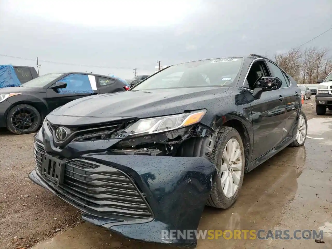 2 Photograph of a damaged car 4T1B11HKXKU743659 TOYOTA CAMRY 2019