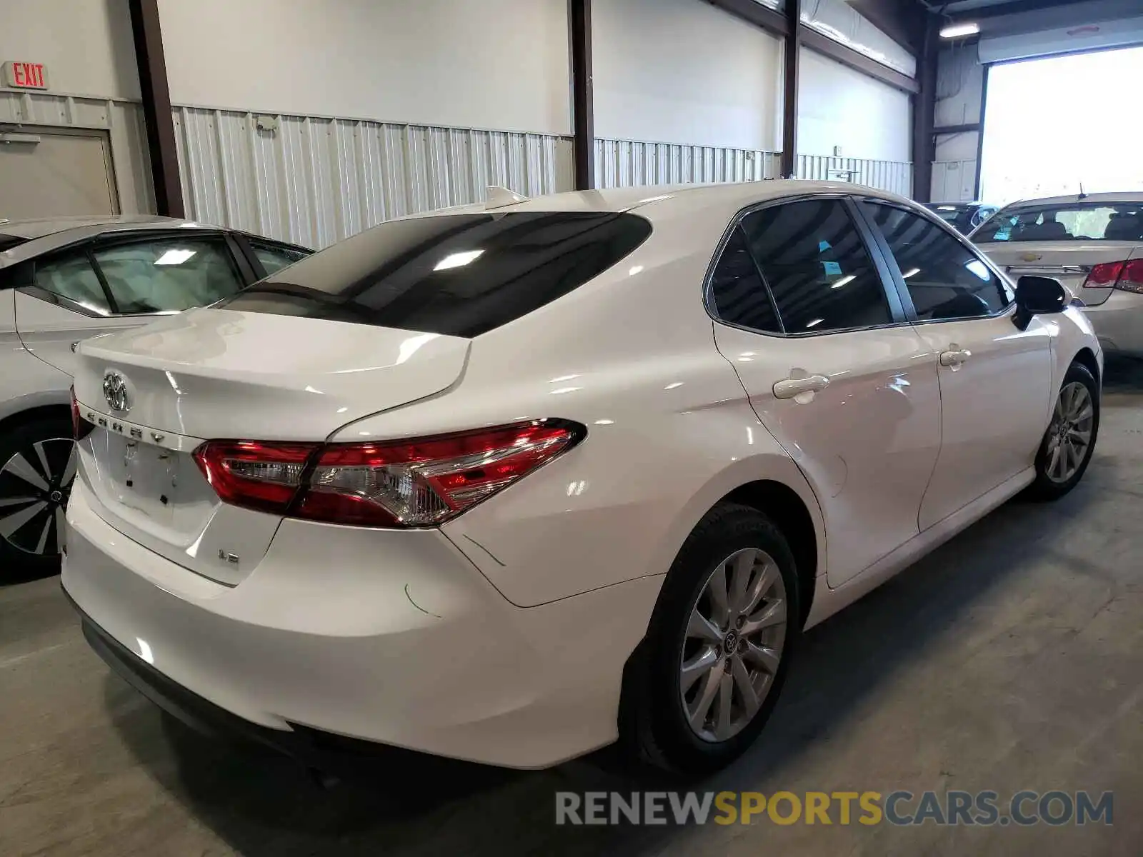 4 Photograph of a damaged car 4T1B11HKXKU743662 TOYOTA CAMRY 2019