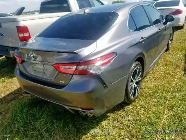 4 Photograph of a damaged car 4T1B11HKXKU748702 TOYOTA CAMRY 2019